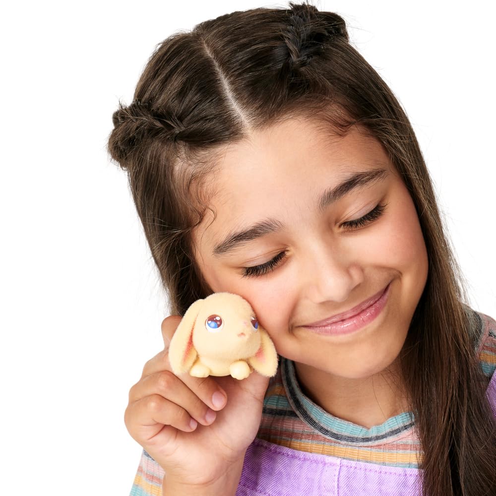 Little Live Pets - Mama Surprise Minis. Feed and Nurture a Lil' Bunny Inside Their Hutch so she can be a Mama. She has 2, 3, or 4 Babies with Surprise Accessories to Dress Up The Babies